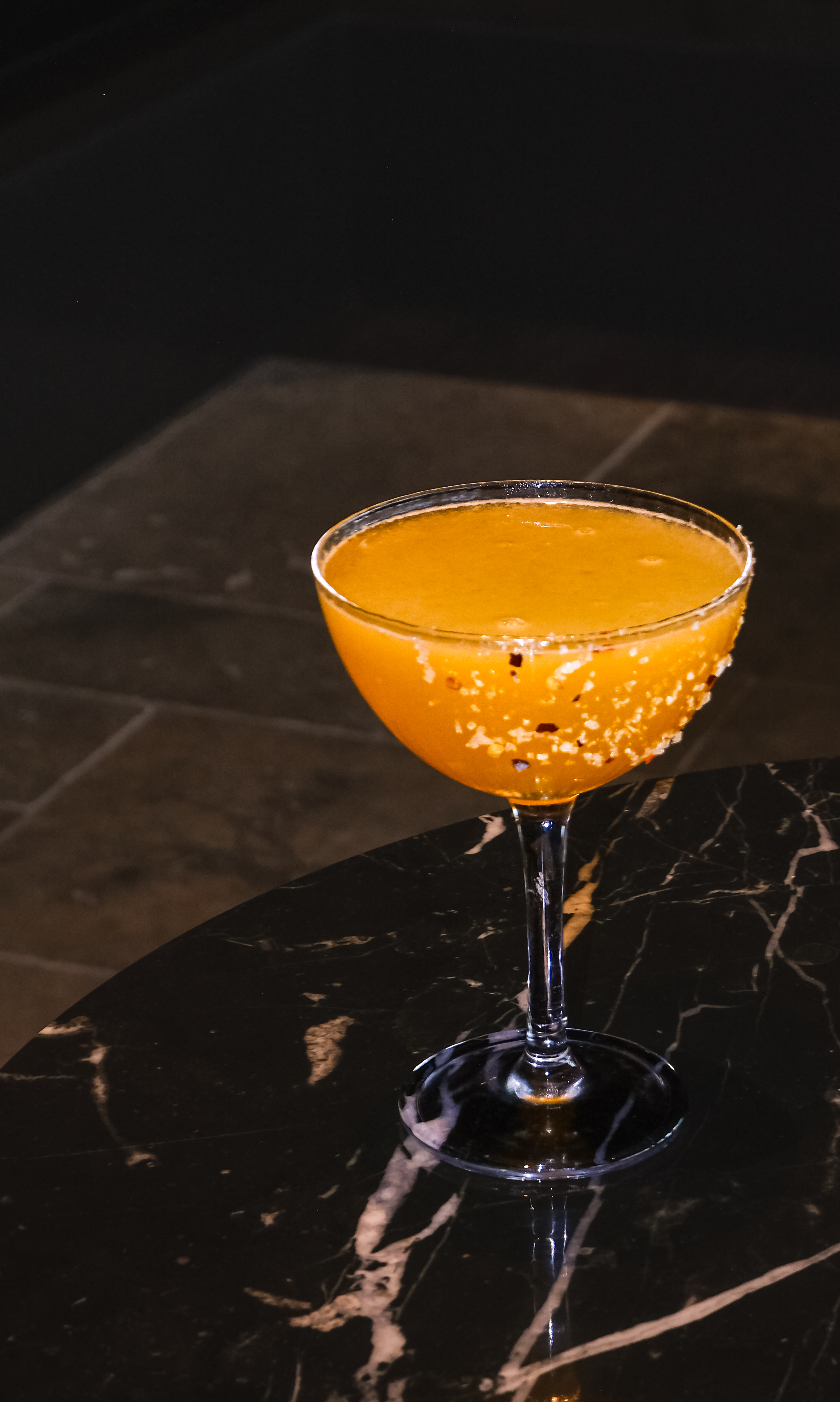 Golden Heat Margarita — amber cocktail with chilli-salt rim